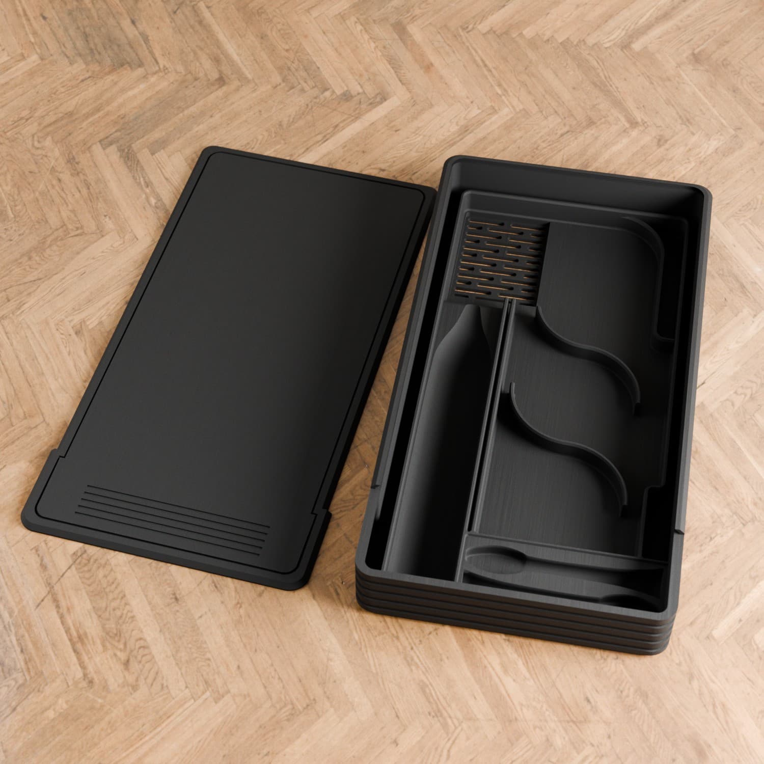 Open empty black tray and lid on wood flooring