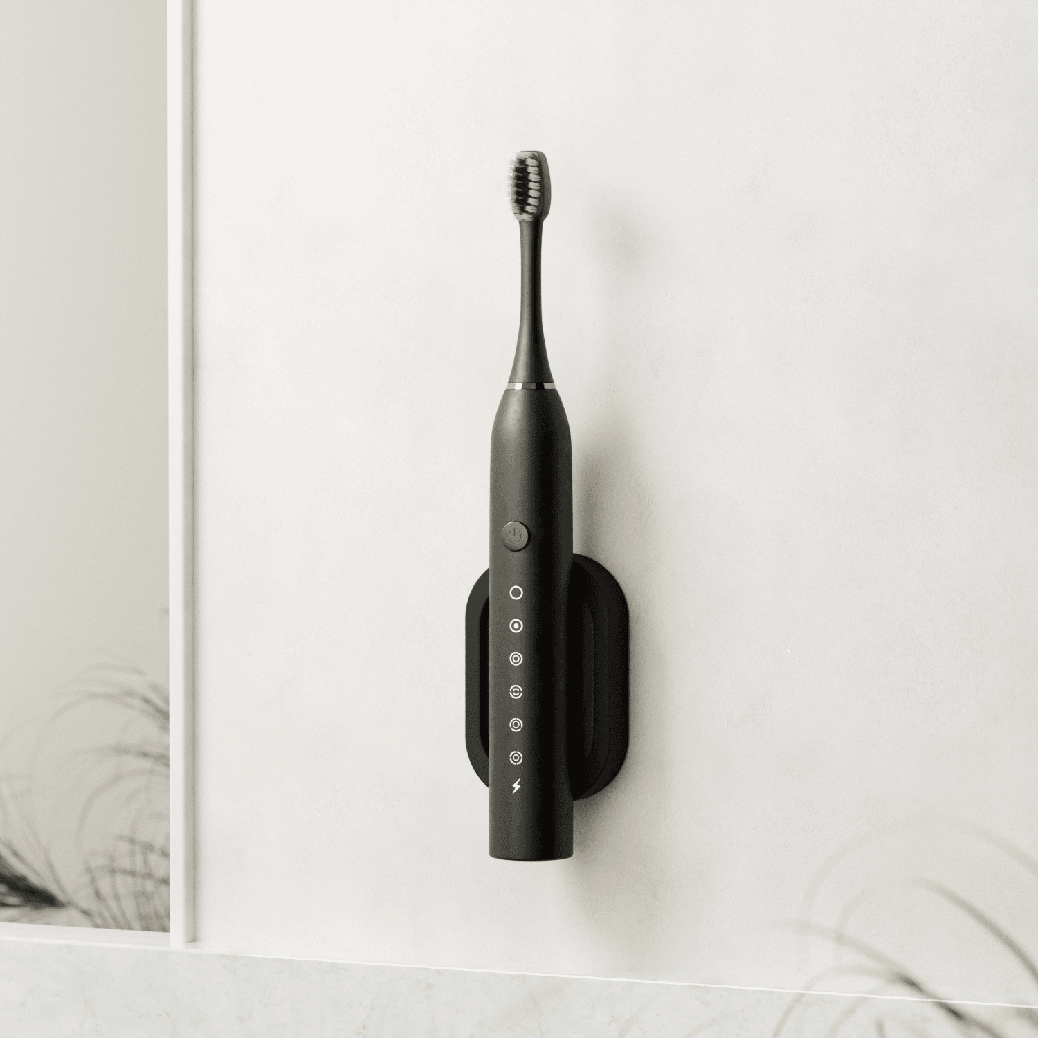 Wall-mounted black electric toothbrush